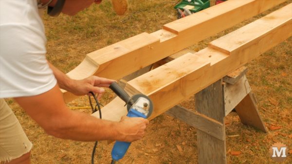 Angle grinder with sanding disc is very good for quickly chamfering in tight spots - Timber Frame Gazebo