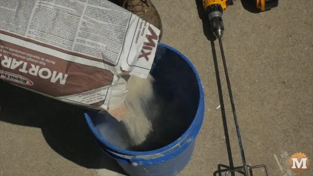 mixing concrete in a pail or bucket