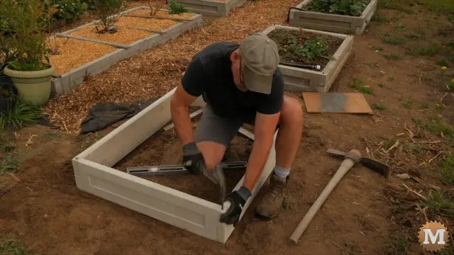 assembling the panels into a garden bed