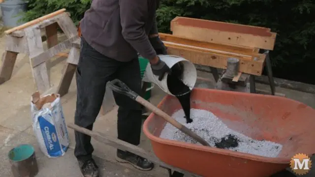 cement color added to perlite concrete mix an a wheelbarrow
