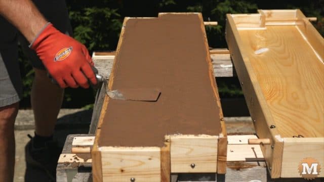 DIY Concrete Garden Box Easy Form - Small trowel smooth surface of concrete