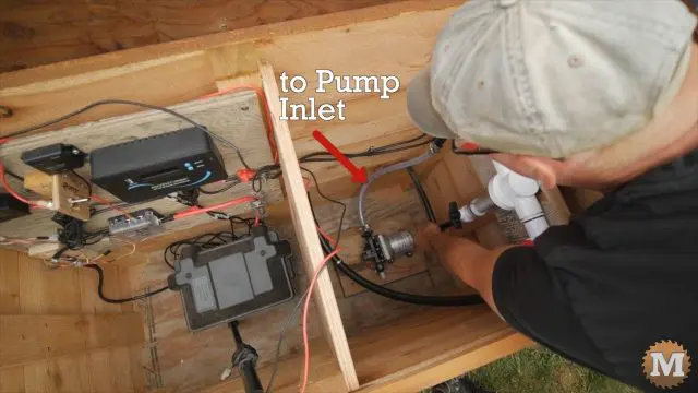 connecting RV DC water pump inlet to line from rainwater tank