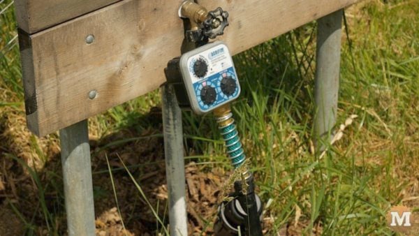 man about tools remove silt mud sediment from well Drip Irrigation Analog Timer
