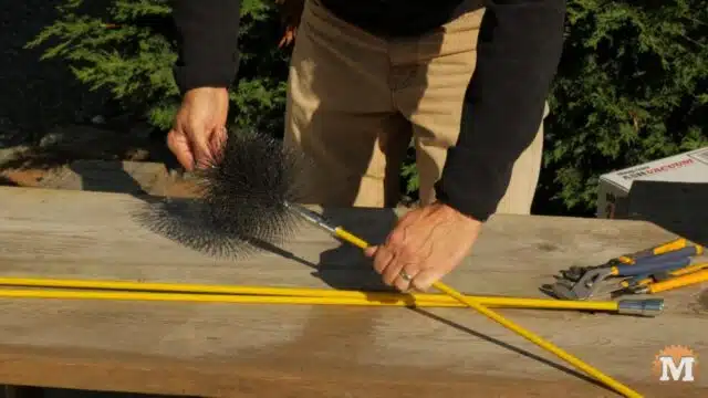 Chimney Brush attached to flexible rod