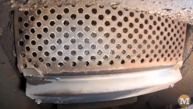 Catalytic converter sits behind this protective metal screen