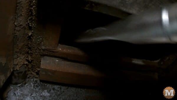 Crevice tool fits past the bypass door to pick up some creosote flakes Crevice tool fits past the bypass door to pick up some creosote flakes