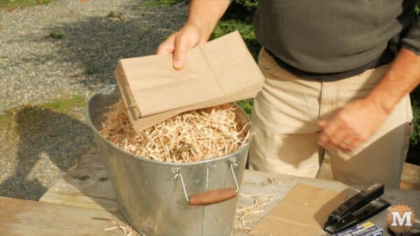 Dried fire shavings and paper lunch bags Dried fire shavings and paper lunch bags
