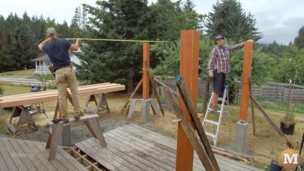 Checking all post dimensions before laying out and cutting any beams - Three Gable Pavilion Checking all post dimensions before laying out and cutting any beams