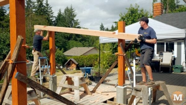 Three Gable Pavilion -- The second beam lifted into position. Three Gable Pavilion -- The second beam lifted into position.