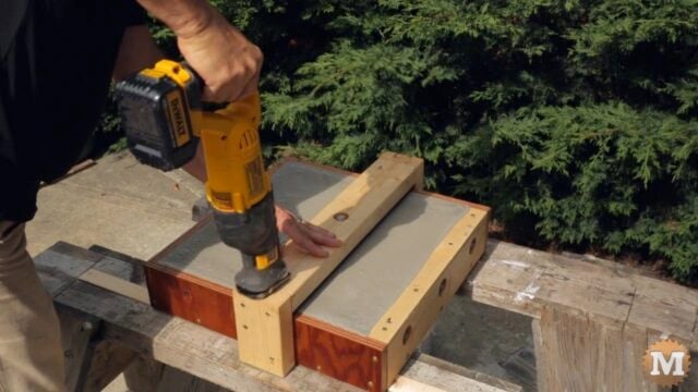 vibrating and settling the concrete mix