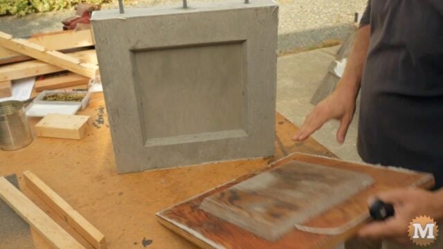 stripping the forms from the concrete casting