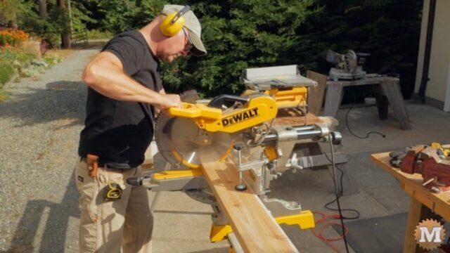 cutting the red cedar slats to make the seat of the outdoor concrete garden bench
