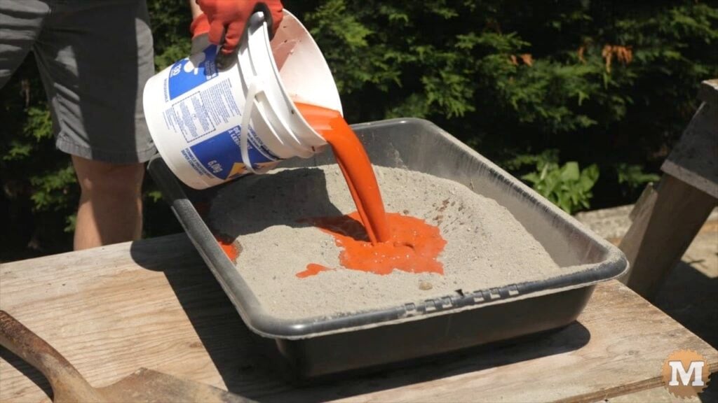 DIY Concrete Garden Box Easy Form - Add diluted dye to dry concrete mix