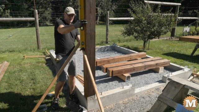 Plumbing a 6x6 fir corner post for a greenhouse build