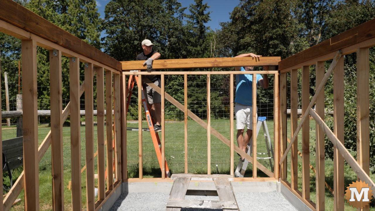 Post and beam greenhouse cross tie drops into place over stud wall