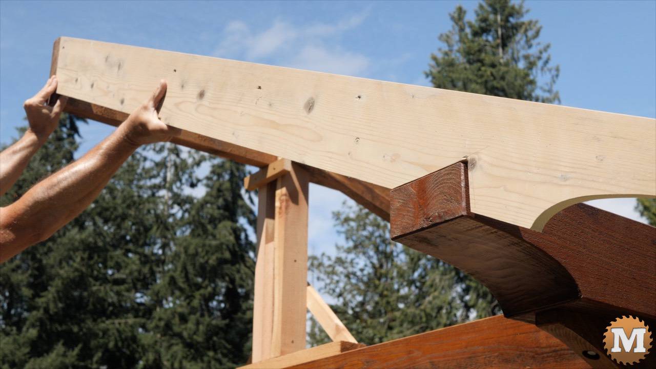 Laying a rafter pattern over the greenhouse beams