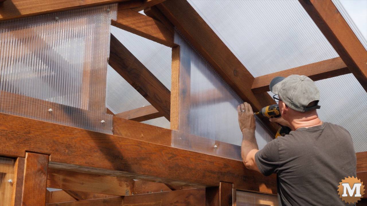 Polycarbonate glazing on a greenhouse wall
