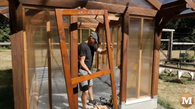 Installing a cedar door in a greenhouse