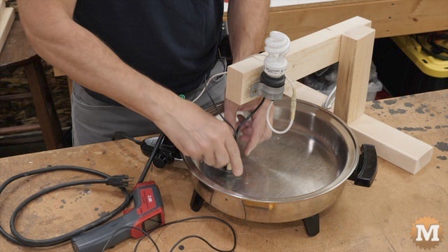Setting the thermostat on the hot skillet