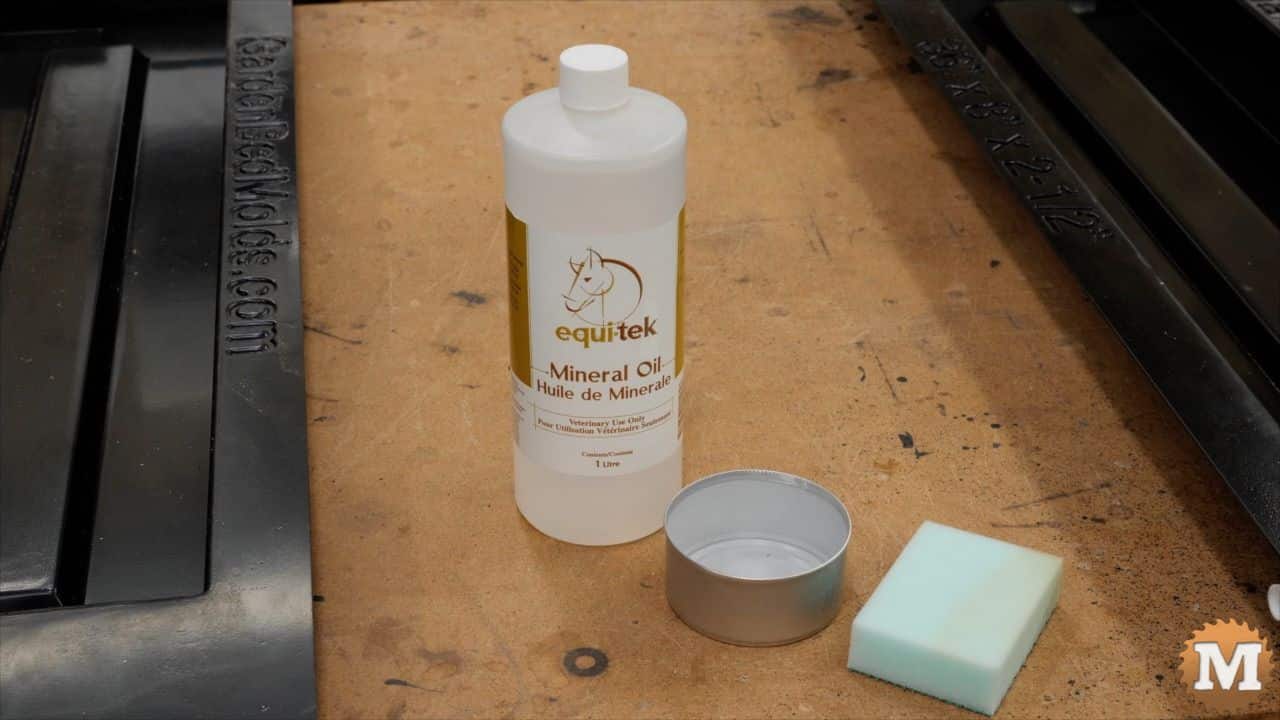 bottle of food grade mineral oil and sponge