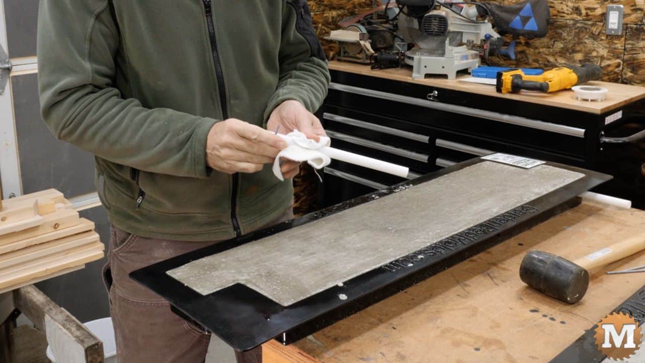 cleaning a plastic pipe after removing it from hardened concrete