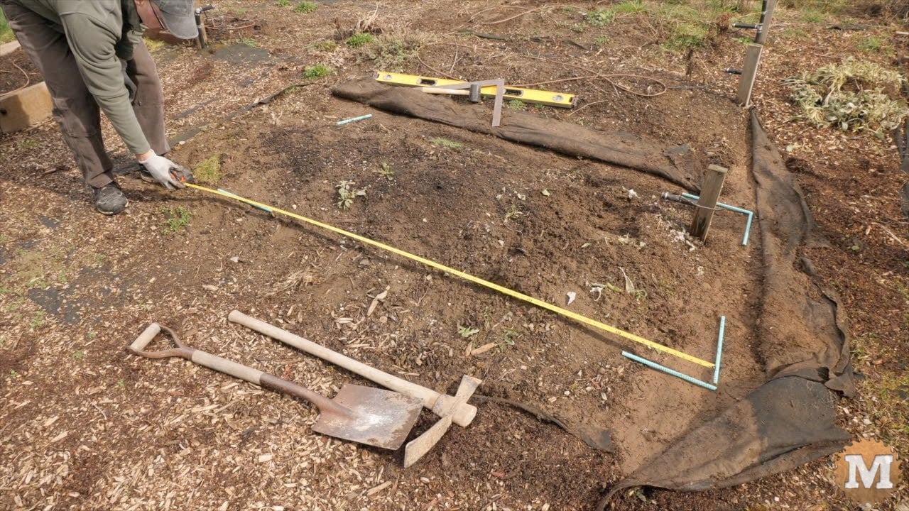 taking some measurement for a raised bed