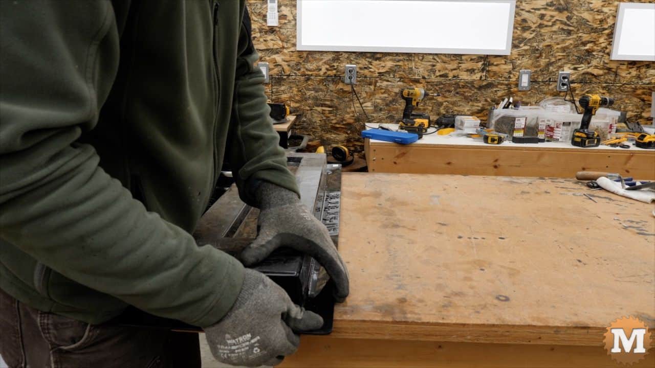 flexing the ABS plastic mold to free the concrete casting