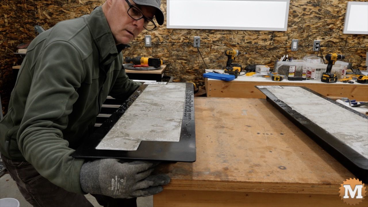 lifting the mold with concrete from the ends