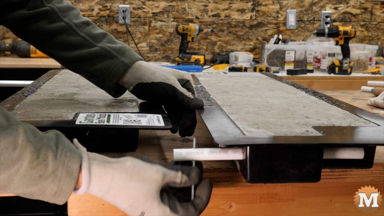 removing the pipe from the concrete mold