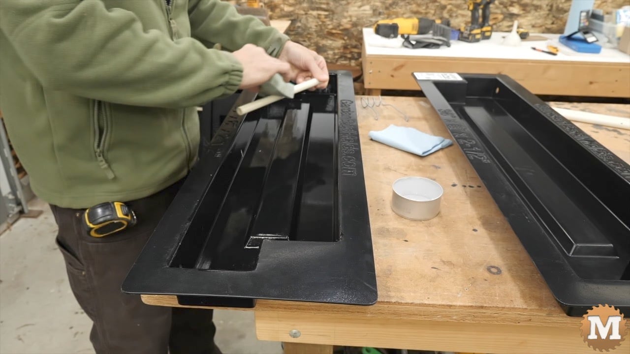 Oil being wiped on a plastic pipe