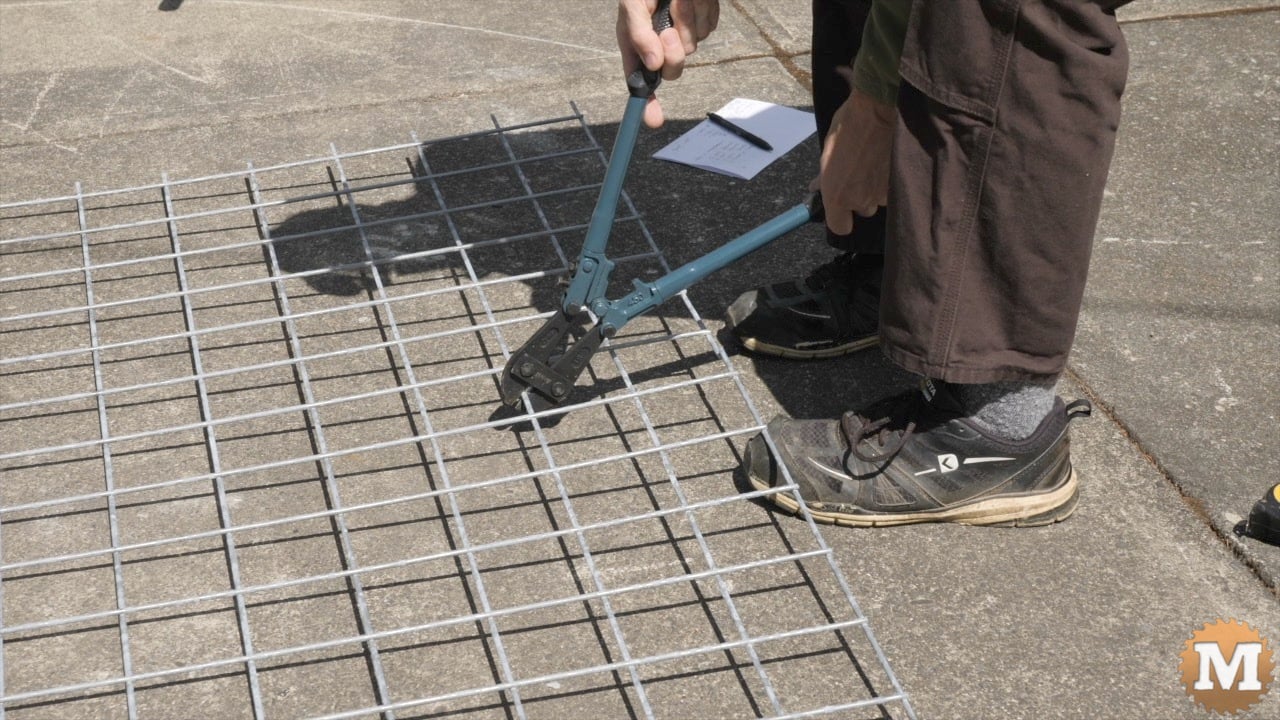 Cutting wire grid outside with bolt cutters