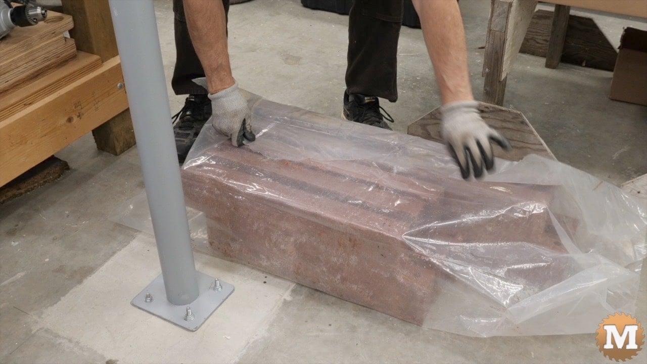 Covering concrete castings with plastic