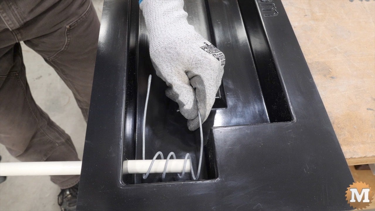 Adding a pipe to a concrete mold