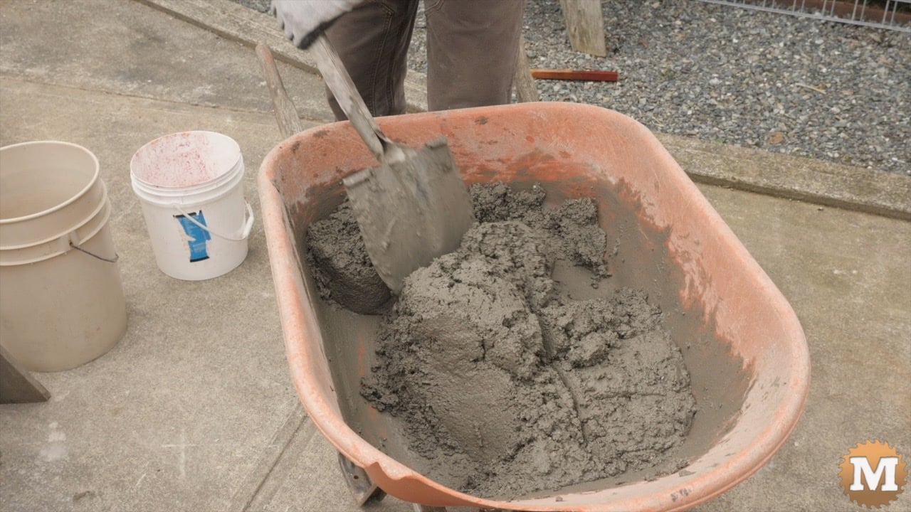Wet concrete in a wheelbarrow