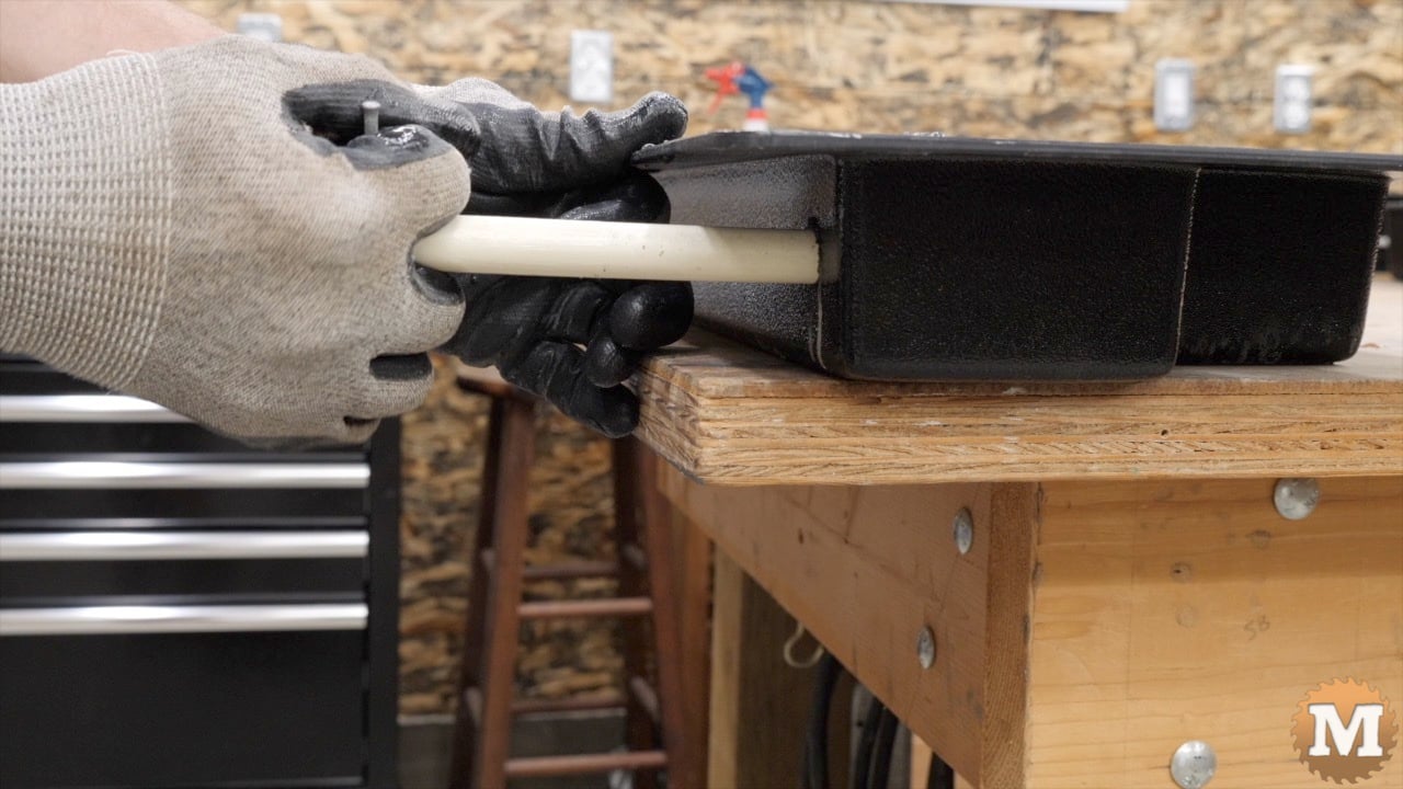 pipes pulled from a concrete mold