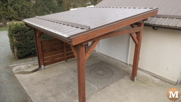 A wooden lean-to pavilion