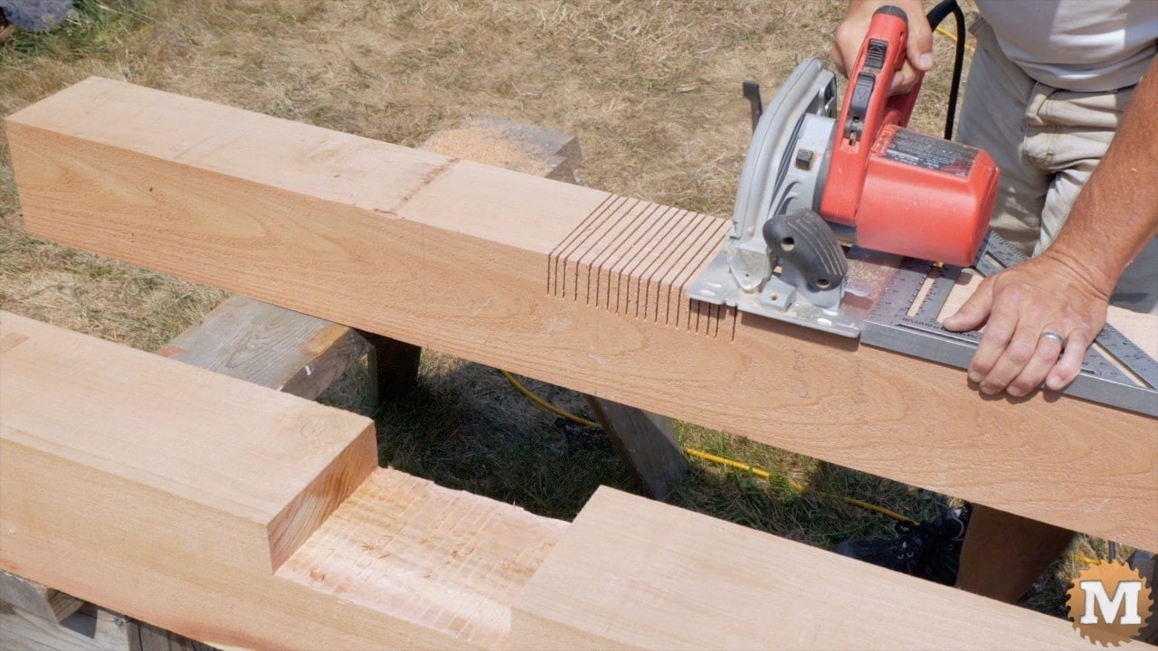 A circular saw cutting a beam or post