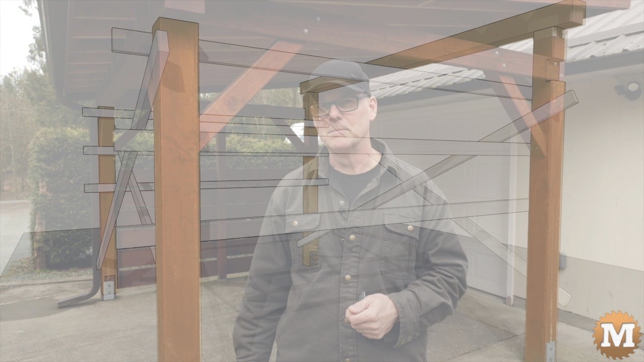 Man in front of pavilion construction