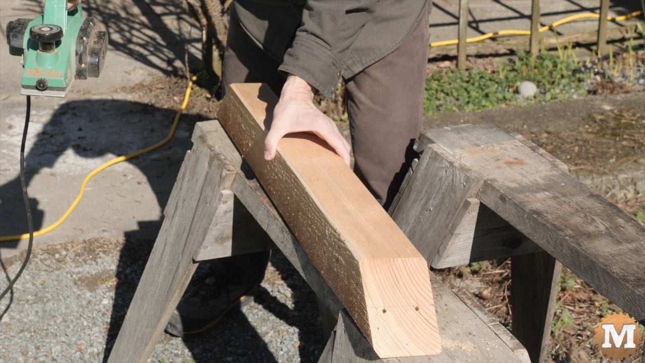 chamfering a corner brace with a power plane