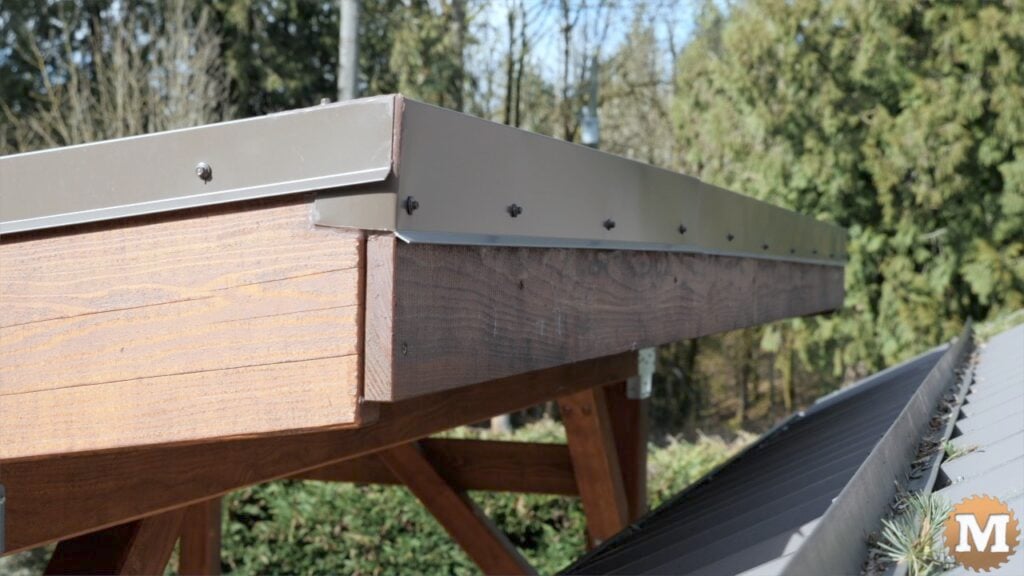 a wood structure with metal siding