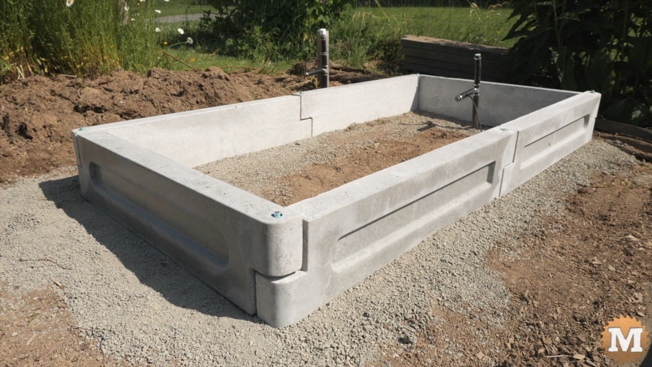 completed round end concrete garden bed