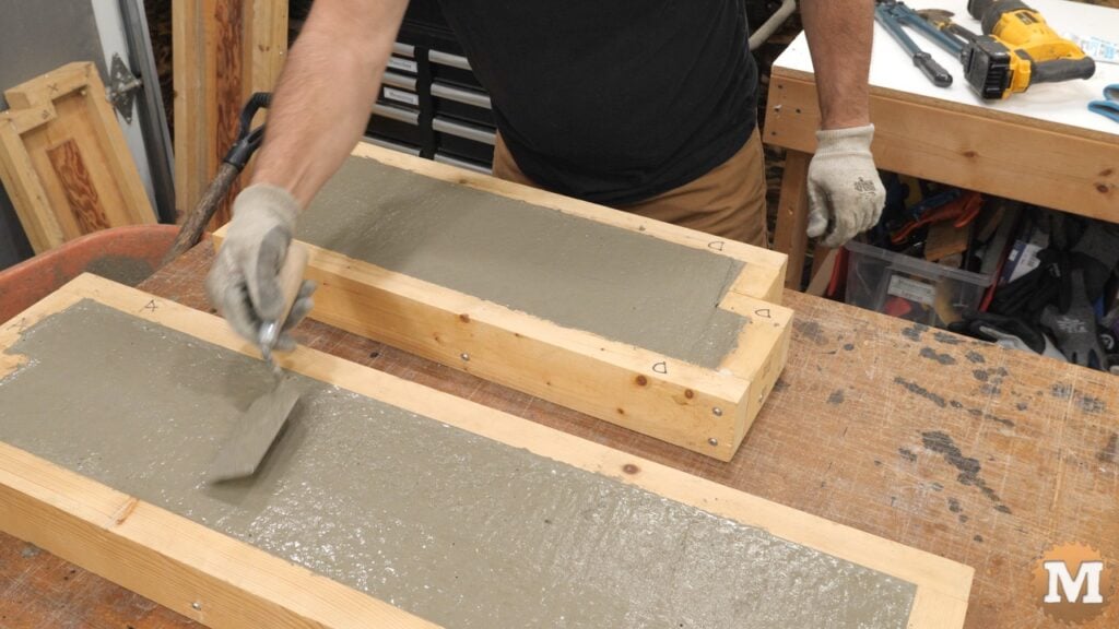 finishing wet concrete with a small trowel