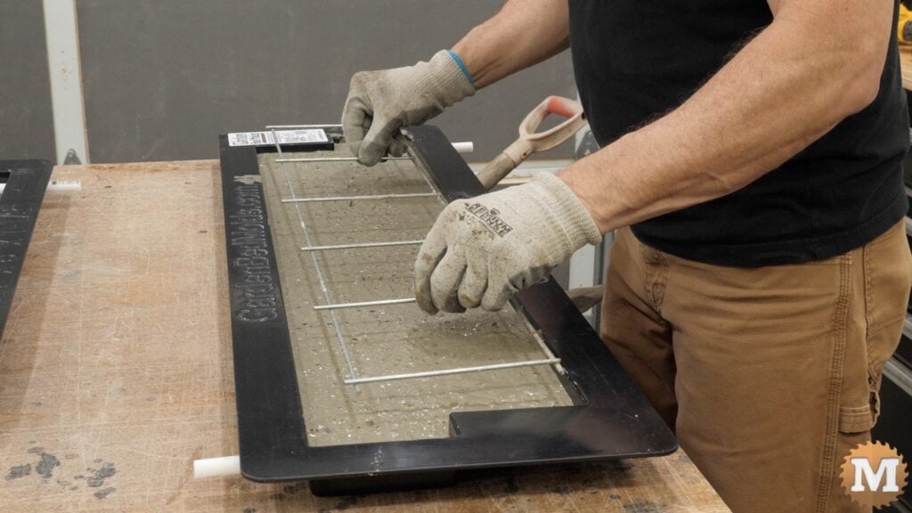 wire grid being placed in a concrete casting